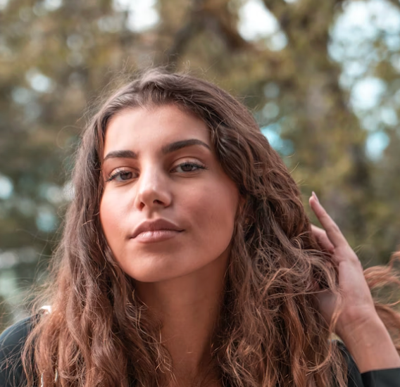 Brunette woman outdoor nature portrait